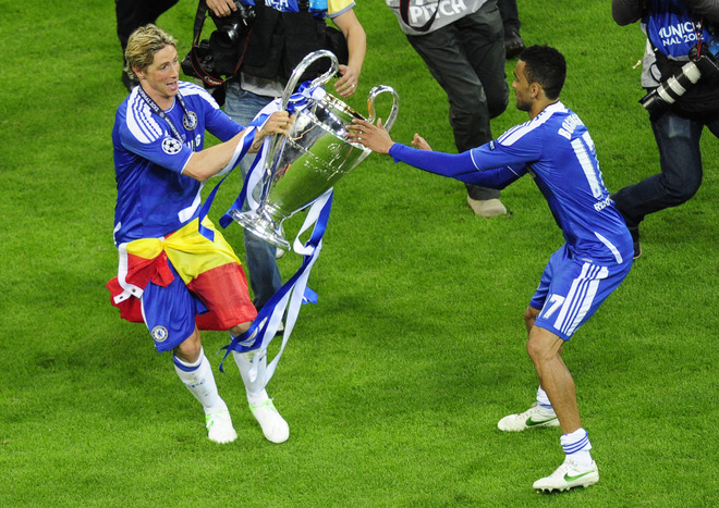 Chelsea's Spanish Forward Fernando Torres (L) And Chelsea's Portuguese Defender Jose Bosingwa Celebrate With The Trophy 