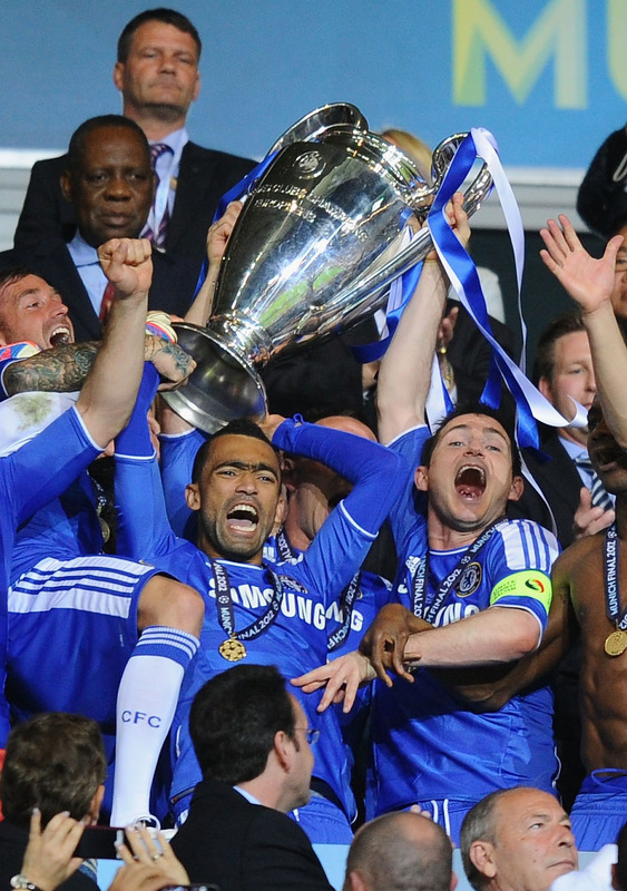   Frank Lampard (R) And Jose Bosingwa (C) Of Chelsea Lift The Trophy In Celebration 