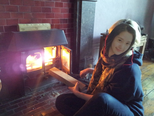 Yoona tending to the fire