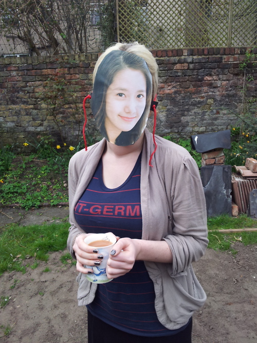 Yoona in garden with tea